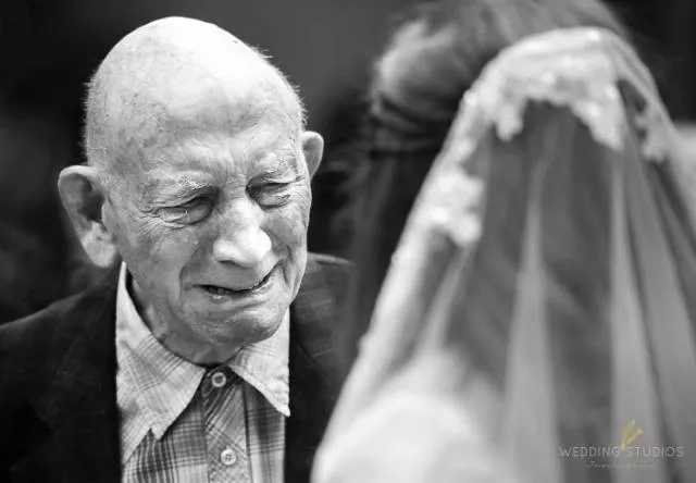 The emotion of parents at a wedding