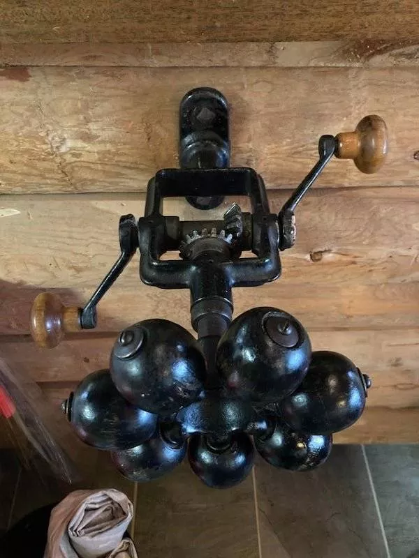 Unknown objects - #1 Rope winder. Each head would hold a string, the spinning would then wind them together.