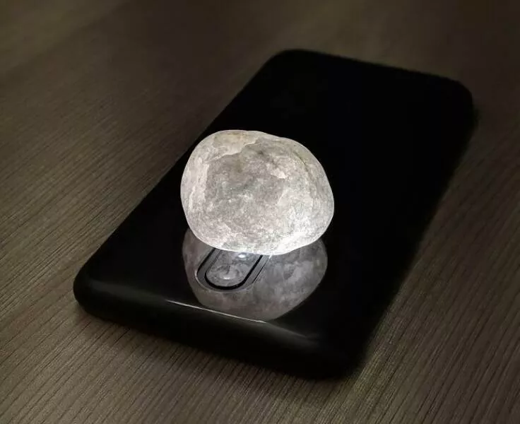 Double take delights moments that require a second glance - #12 Flashlight Through A Rock Makes It Look Like The Moon