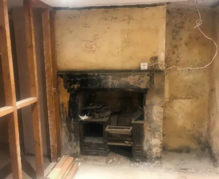 Surprising finds at home unintentional discoveries that stunned residents - #45 A wall was removed in a Victorian house we are working at, revealing an old cast-iron fireplace. It is estimated to be around 1850