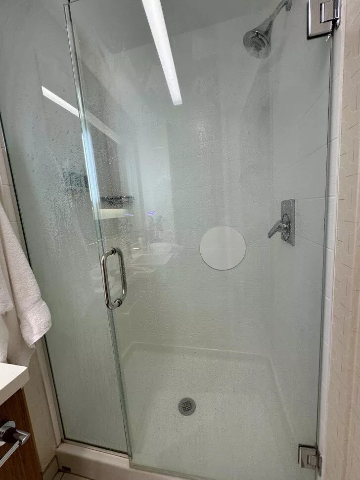 Wonders revealed gaze of discovery - #28 The shower door in my hotel has a random hole in the middle.