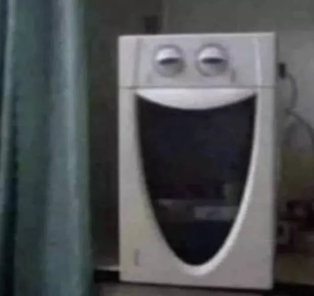 Enigmatic visuals unsettling images for a haunting experience - #25 A microwave turned on its side. Enigmatic visuals unsettling images for a haunting experience - #25 A microwave turned on its side.