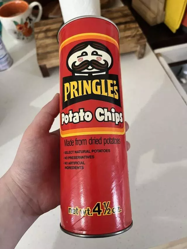 Subtle allure exploring the charm of mildly interesting moments - #27 This pristine 1970s Pringle can found in a 1999 rental home.