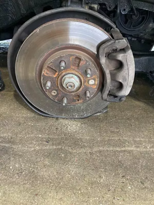 Comic calamities hilarious tales of navigating a rough day - #32 Tire jacks failed while putting on a spare tire.