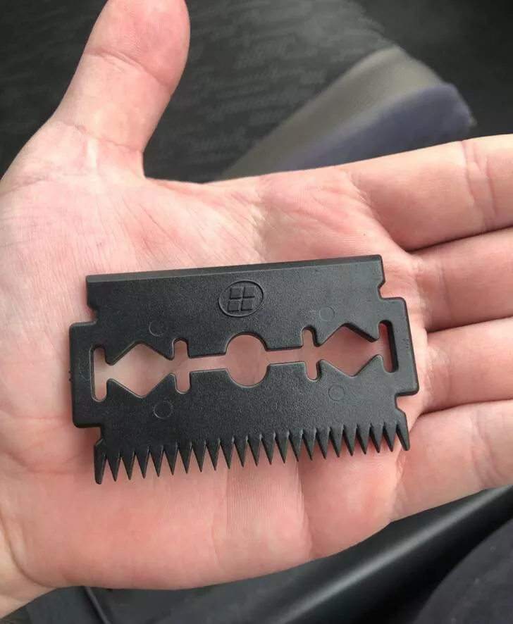 Revealing mysteries unveiling the secrets of enigmatic objects - #18 I found this black, comb-like plastic thing in my car. It's just over an inch long. I have no idea where it comes from, or what it is.
