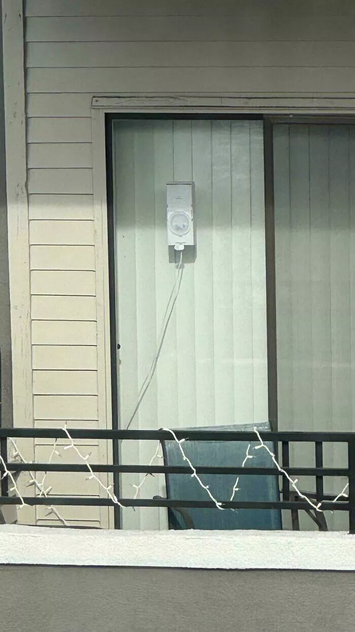 Puzzling enigmas unveiling the mystery objects that left everyone scratching their heads - #39 Electronic Device on Neighbor's Balcony – 1.5 Feet x 8 Inches, Occasional Light