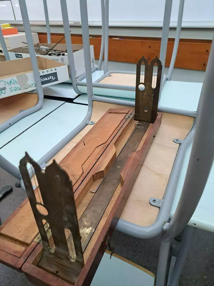 Puzzling enigmas unveiling the mystery objects that left everyone scratching their heads - #49 Unidentified Object Inside a Wooden Box with Numbers at the Base and Wires – Potentially Missing Parts