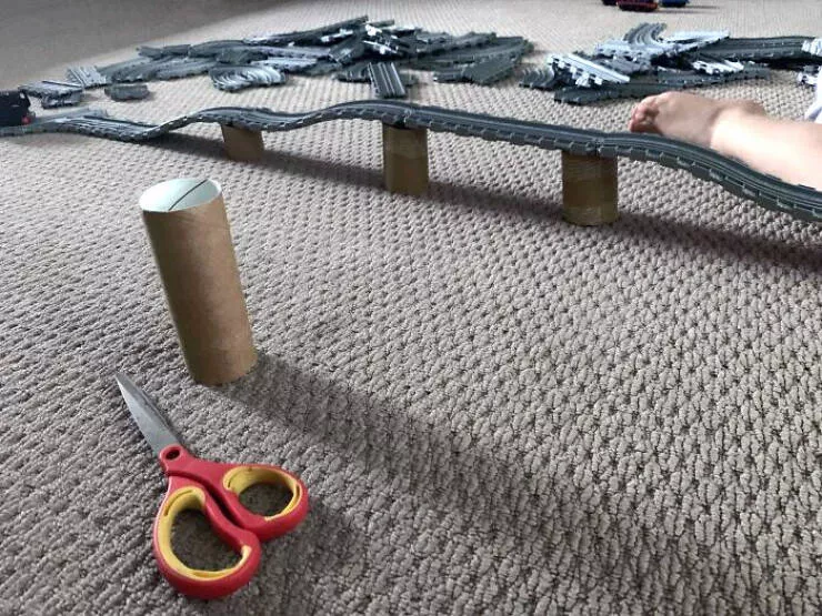 Creative parenting strategies ingenious hacks for todays moms and dads - #19 Cut Toilet Rolls Down And Use Them As Bridge Pillars For Your Kid's Train/Car Tracks