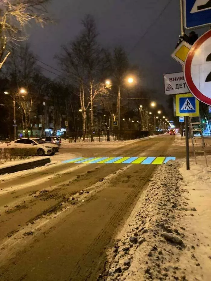 Intriguing discoveries subtly surprising finds that captivate - #25 A crosswalk projected onto a dirty winter road