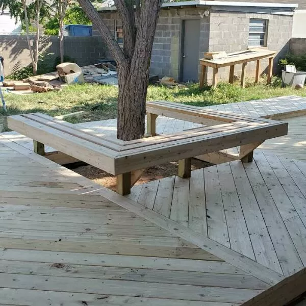 Woodworkers transforming craft into art - #12 The owner wanted to cut down the tree for the deck, but I convinced him to build a bench around it instead. I think it turned out nice and saved the tree