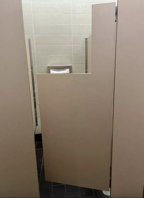 Design fails when creativity misses the mark - #15 Virtually useless stall doors in a public bathroom