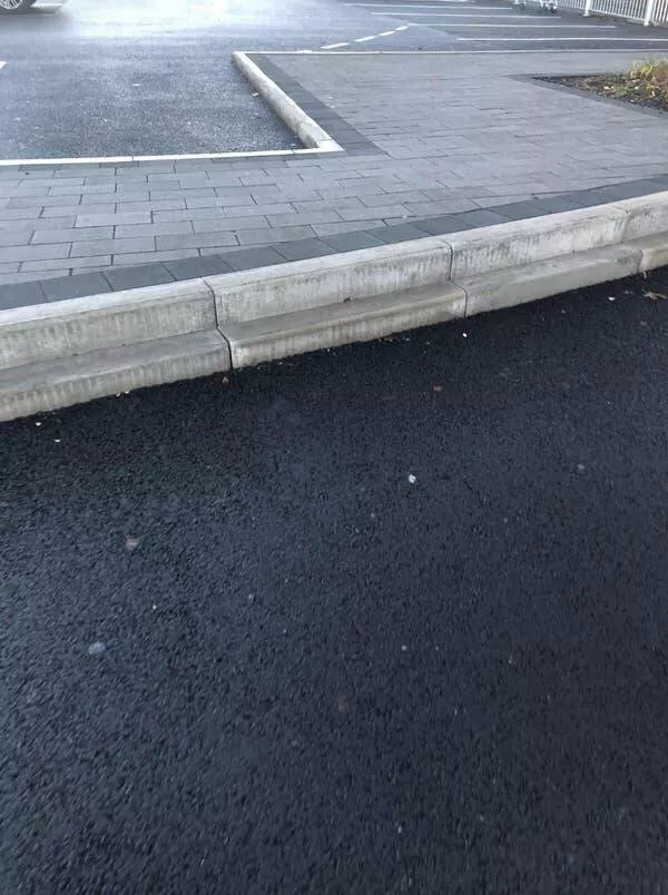 Design fails when creativity misses the mark - #16 And finally, a curb with a small step perfect for slipping on