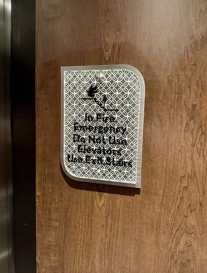 Design fails when creativity misses the mark - #2 This fire emergency sign that's nearly impossible to read
