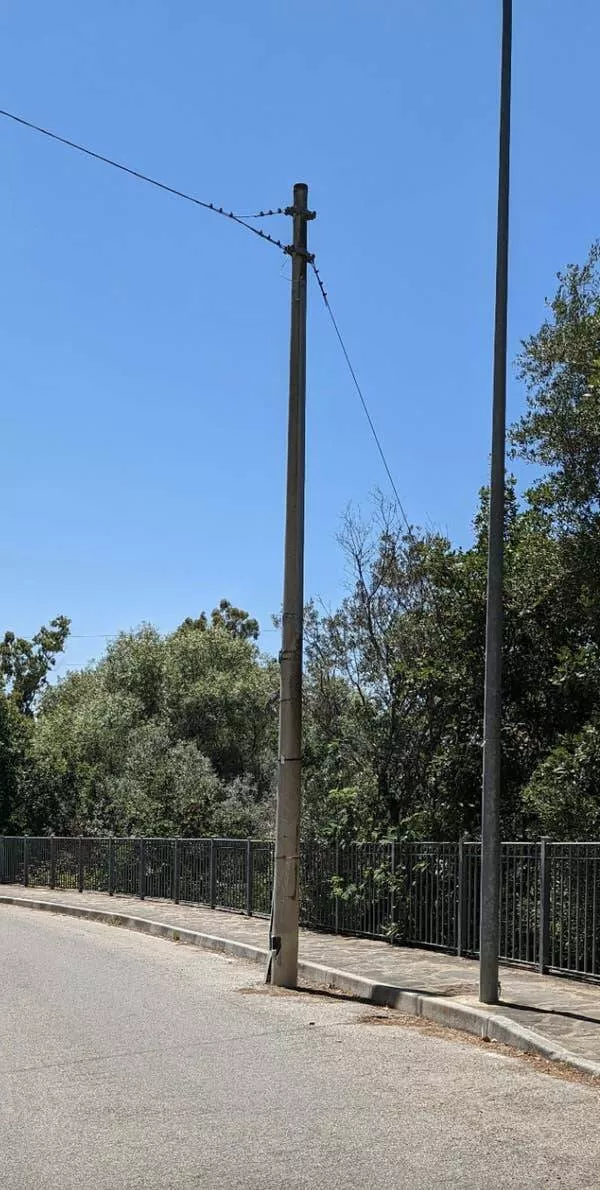 Design fails when creativity misses the mark - #6 A pole placed on the road instead of the sidewalk