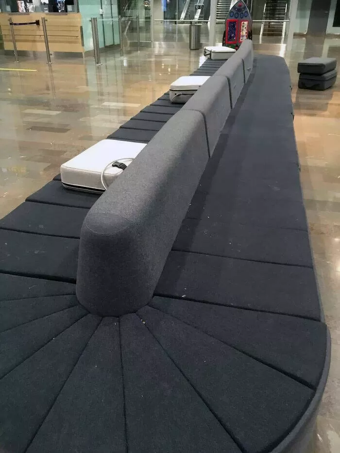 Airport anarchy wild photos that break all the rules - #10 This sofa at Stockholm Airport looks like a baggage carousel with suitcase cushions
