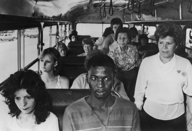 Timeless everyday moments captured in historical photographs - #1 A young Black man defying apartheid laws rides a whites-only bus in Durban, South Africa, 1980s