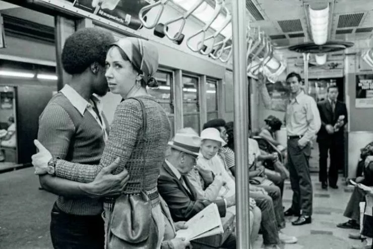 Timeless everyday moments captured in historical photographs - #12 A Black man and a white woman embracing on a New York subway - a controversial image for its time, late 1960s