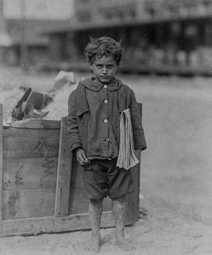 Timeless everyday moments captured in historical photographs - #18 One of America's youngest newsboys (4 years old), Florida, 1913
