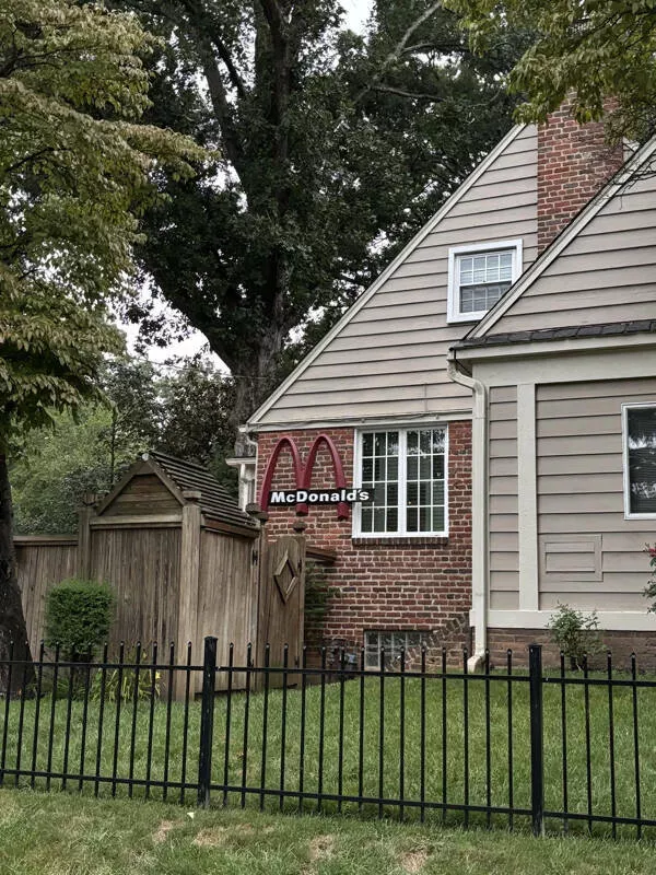 Unusual snapshots that will capture your imagination - #17 This house I see every day has a striking red McDonald's sign on it.