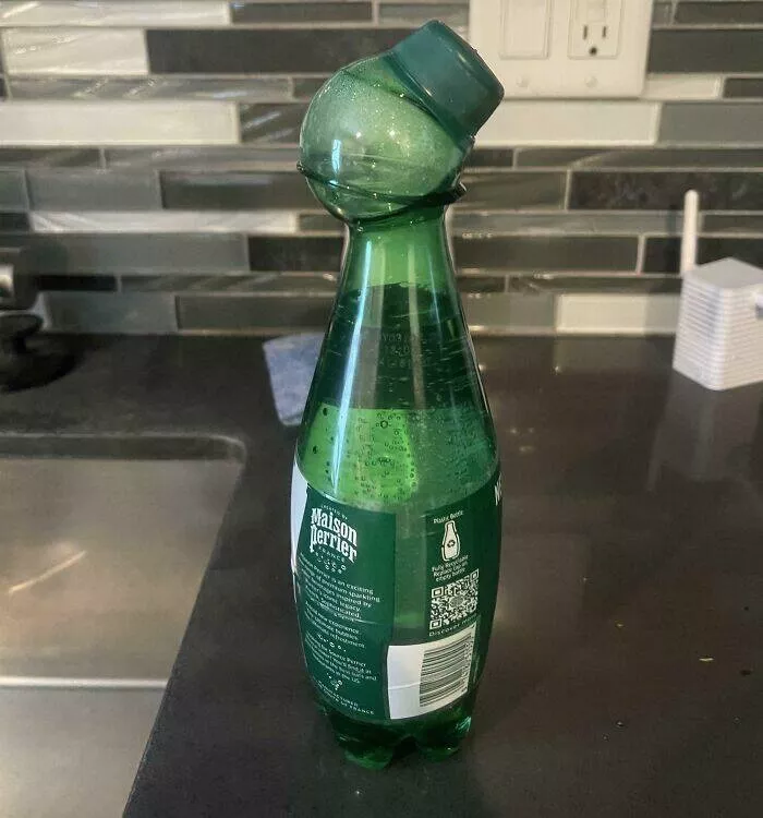 Capturing this summers extreme temperatures - #8 This bottle of sparkling water, left in my truck all day, shows the effects of the heat.
