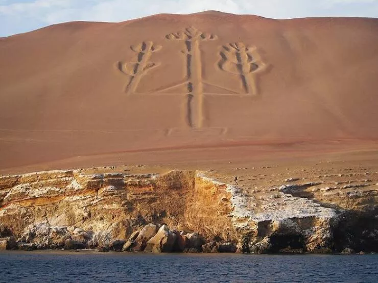 Timeless ancient wonders that continue to astonish - #24 The Paracas Candelabra, a famous prehistoric geoglyph on the northern face of the Paracas Peninsula in Peru's Pisco Bay