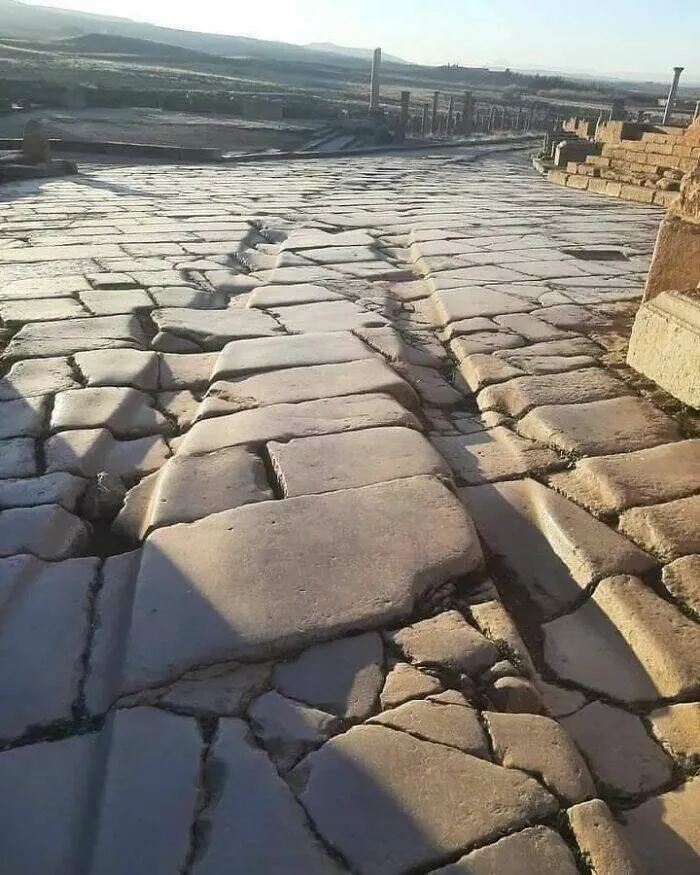 Timeless ancient wonders that continue to astonish - #5 One of the intriguing features of Timgad is the worn tracks left by Roman chariots, etched into the stone streets over centuries Timeless ancient wonders that continue to astonish - #5 One of the intriguing features of Timgad is the worn tracks left by Roman chariots, etched into the stone streets over centuries
