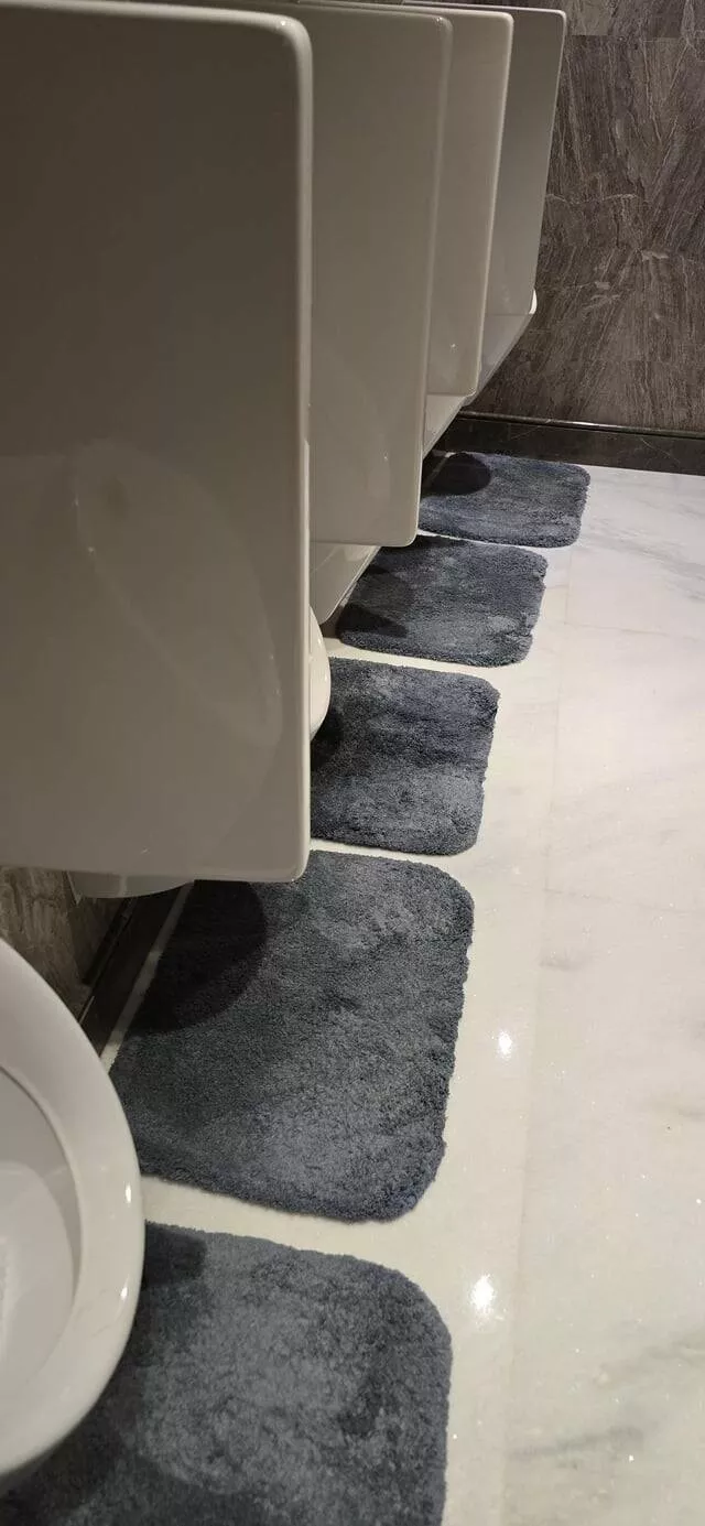 Intriguing photos that will ignite your curiosity - #15 The urinals at our hotel in Delhi have small rugs underneath