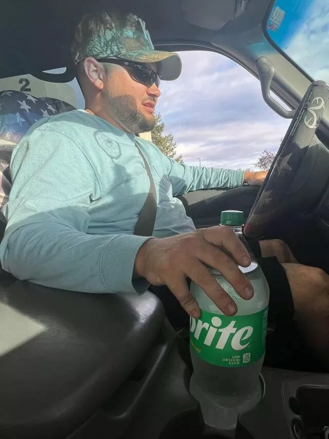 Intriguing photos that will ignite your curiosity - #16 My buddy’s cupholder can accommodate an entire 2-liter bottle
