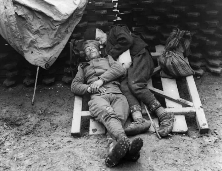 Unveiling hidden histories rare photos that tell untold stories - #3 A Serbian soldier sleeping beside his father who came to visit him on the front line near Belgrade, 1914/1915