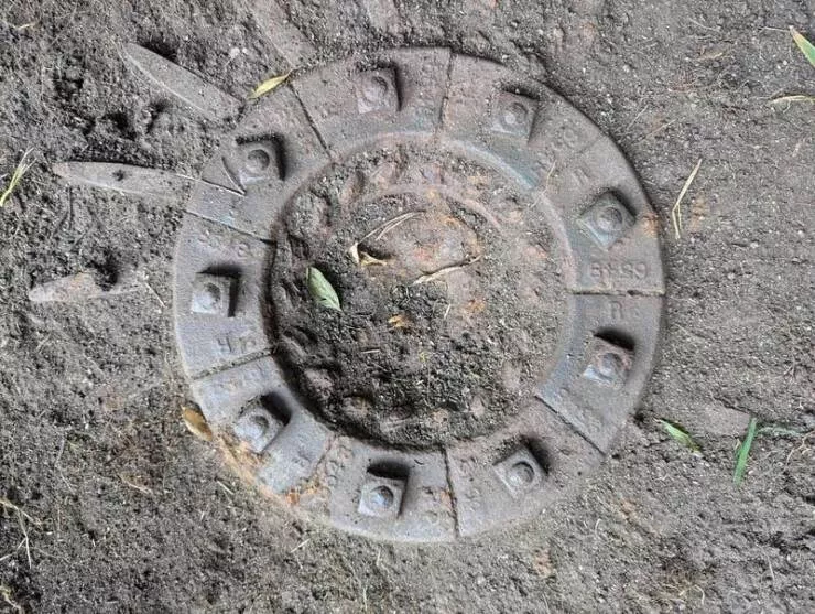 Strange objects solved by internet sleuths - #12 This round object unearthed in someone's yard: