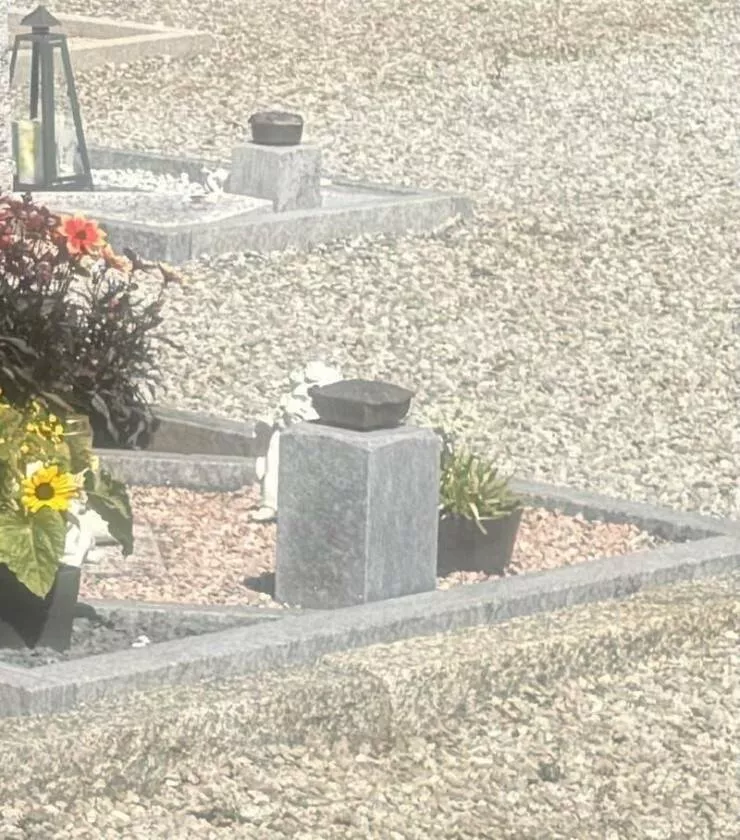 Strange objects solved by internet sleuths - #13 Small metal boxes containing brushes found on gravestones in a cemetery in Andermatt, Switzerland: