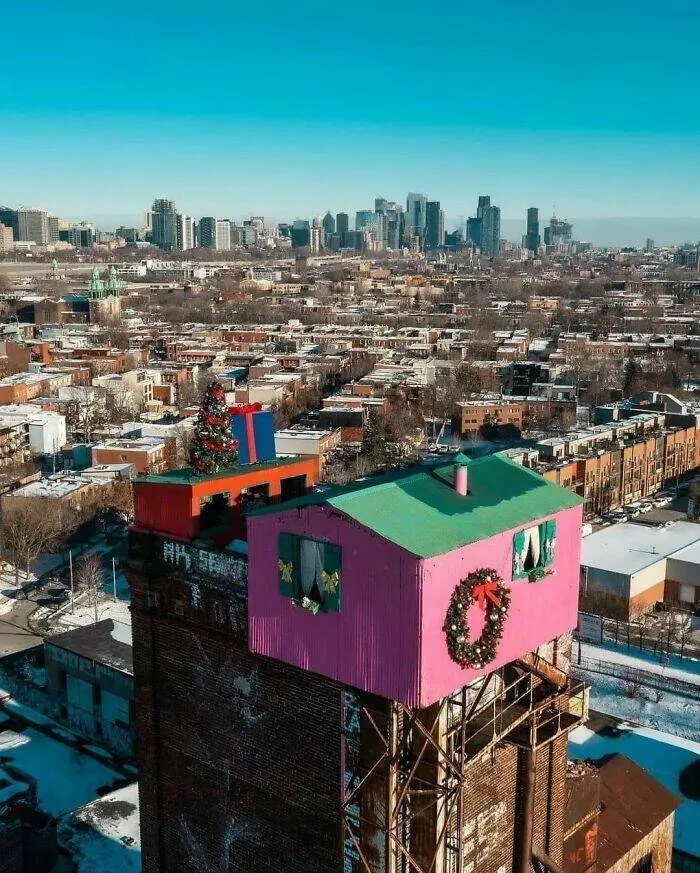 Unusual and bizarre buildings from around the globe - #34 Montreal Decorated The Little House That Sits Atop An Abandoned Factory For The Holidays