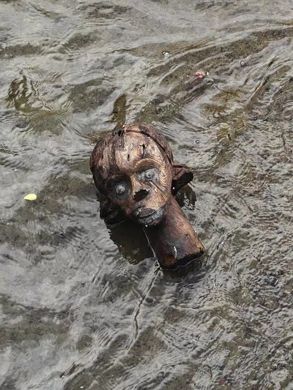 Chilling photos that will haunt your dreams - #18 Wooden Head Omen - A wooden head found washed up in a canal, appearing to be a bad omen. Chilling photos that will haunt your dreams - #18 Wooden Head Omen - A wooden head found washed up in a canal, appearing to be a bad omen.