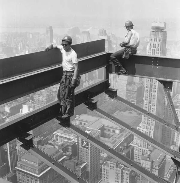 Intriguing images of historical construction projects - #10 Two workers on the Pan American Building, standing on girders 59 stories above the streets of New York.