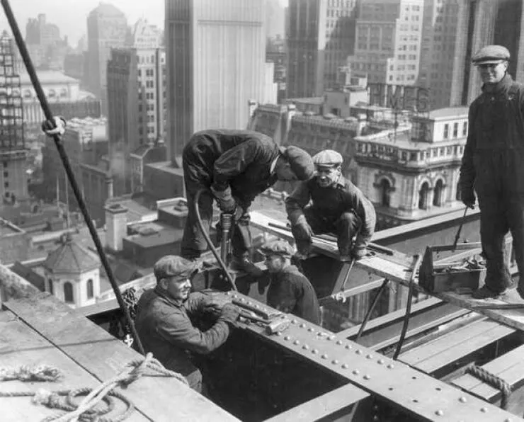 Intriguing images of historical construction projects - #28 Circa 1930: Builders are diligently working on a skyscraper in New York.