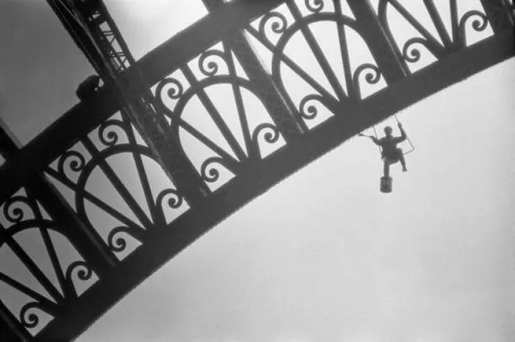 Intriguing images of historical construction projects - #30 Men are shown 500 feet up Blackpool Tower, performing necessary repairs.