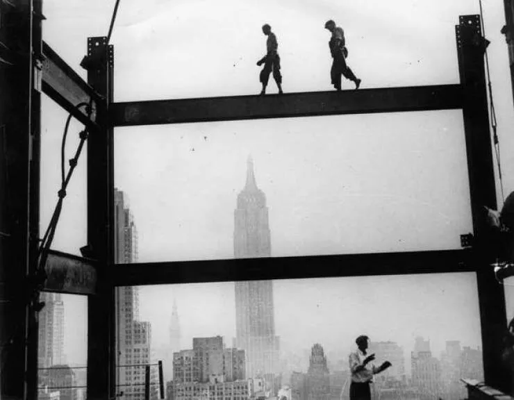 Intriguing images of historical construction projects - #7 Workers navigating the scaffolding of the RCA building.