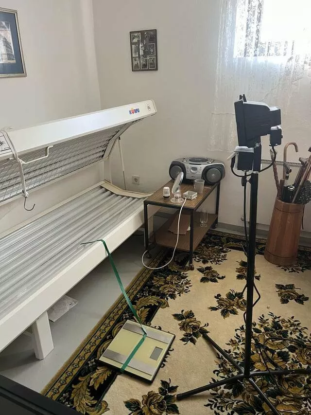 Intriguing photos that will instantly capture your attention - #31 This Airbnb Has A Tanning Bed, A Weight Scale, And A Photography Light In The Same Room