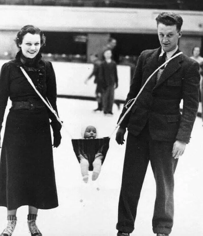 Fascinating moments in history captured in photos - #16 Parents Taking Their Baby Ice Skating In The 1930s