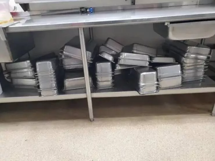 Epic pro kitchen disasters caught on camera - #12 Whoever put these pans away must have the organizational skills of a squirrel.
