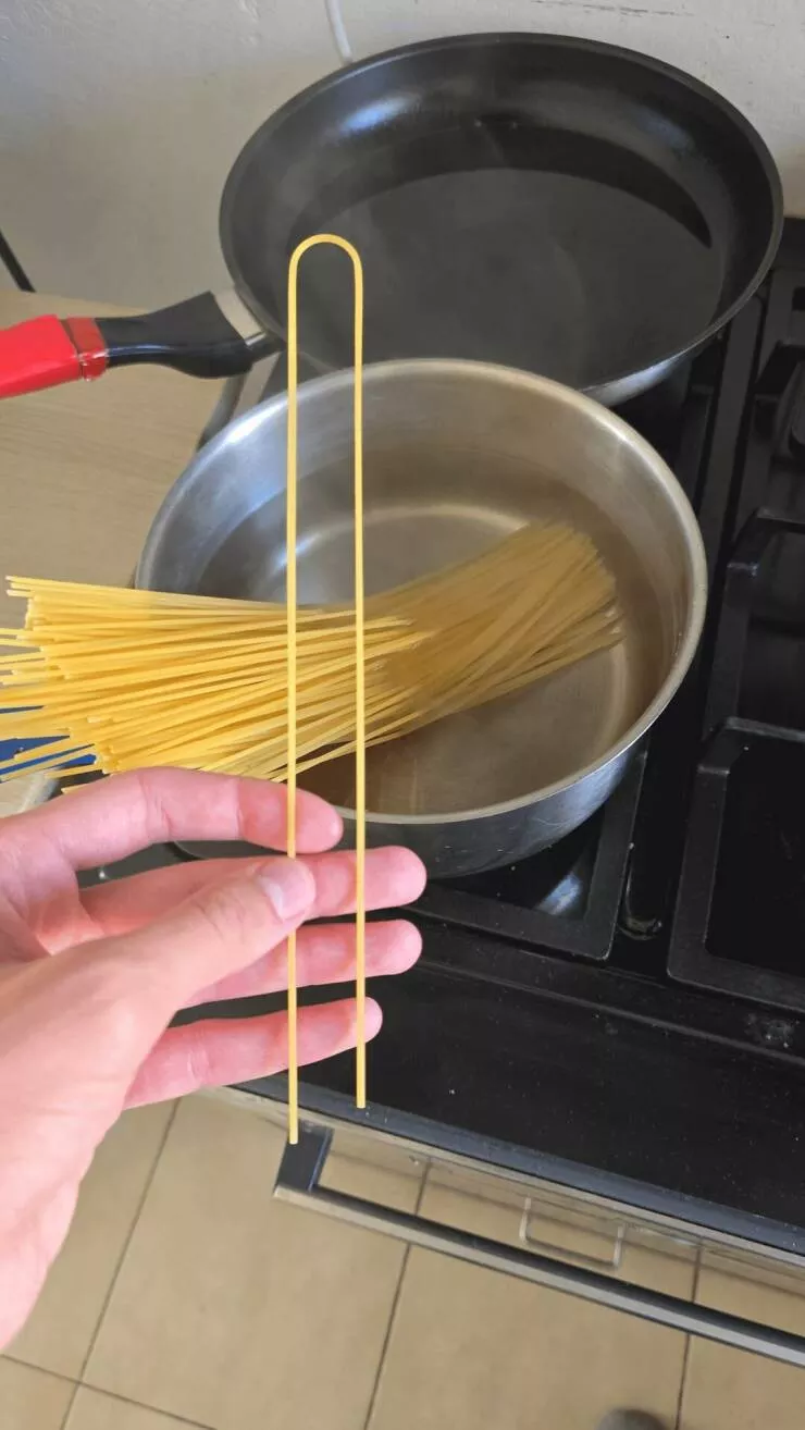 Intriguingly curious photos that ignite your interest - #4 This pasta came out bent and longer than usual.
