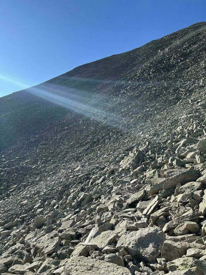Spot the hidden objects - #17 Find my wife in this talus field on Mt. Princeton