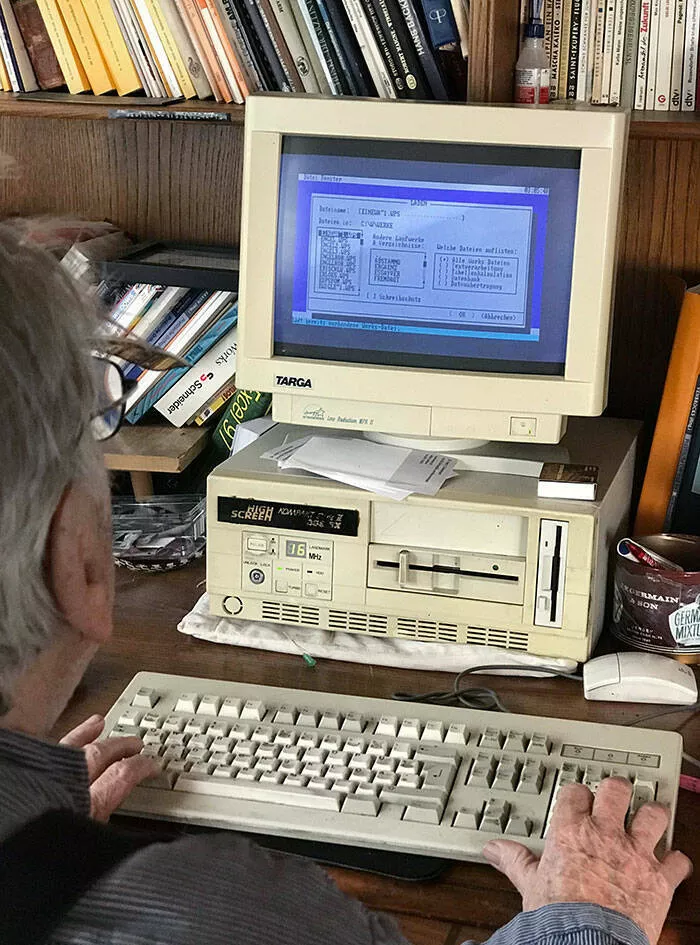 Vintage treasures from the 20th century you rarely spot today - #10 Grandpa still uses a decades-old computer running DOS, typing, printing, and storing things on floppies