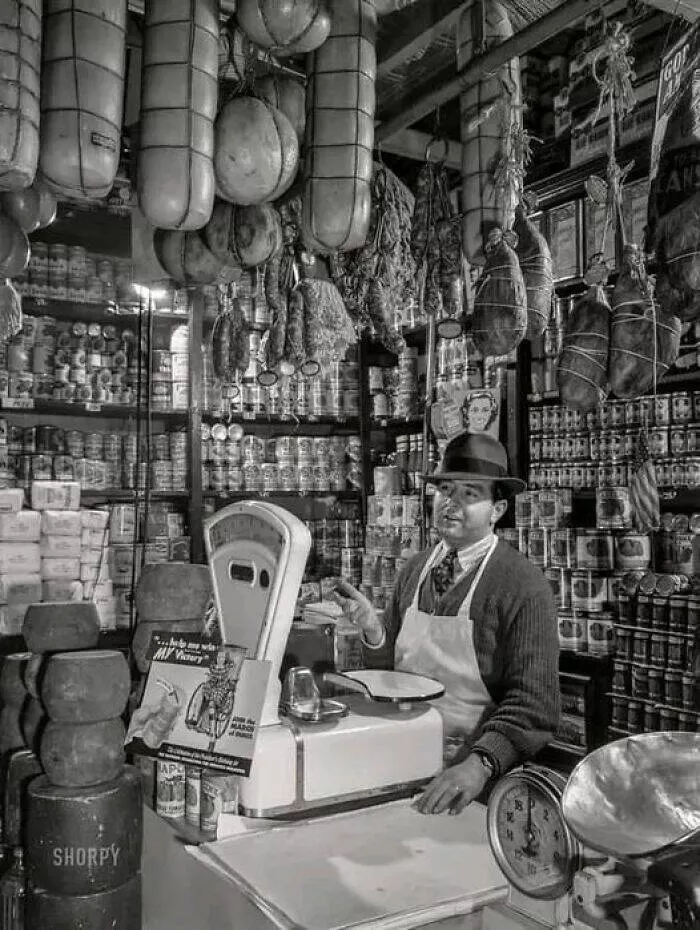 Rare historical photos that reveal fascinating stories - #13 An Italian grocery shop on a bustling New York street, 1943