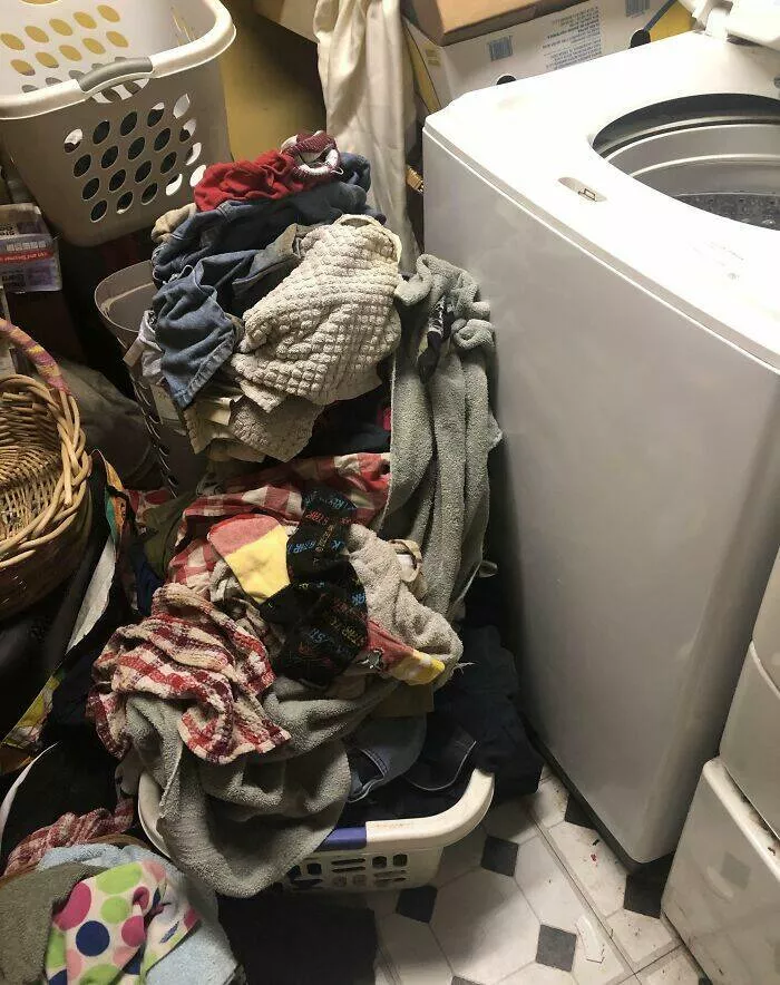 When partners took cluelessness to new heights - #1 Gone for two weeks, and my husband left a pile of clothes by the washer instead of doing laundry