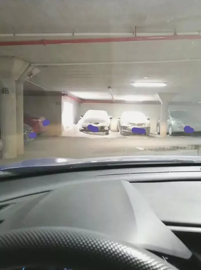 The funniest winter mishaps - #15 The apartment residents whose cars were snowed on through a parking garage grate