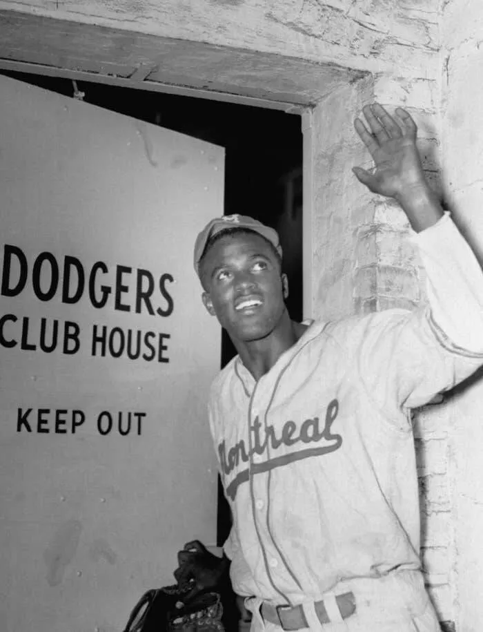 Captivating rare photos worth exploring - #19 Jackie Robinson entering the Dodgers clubhouse for the first time, April 10, 1947