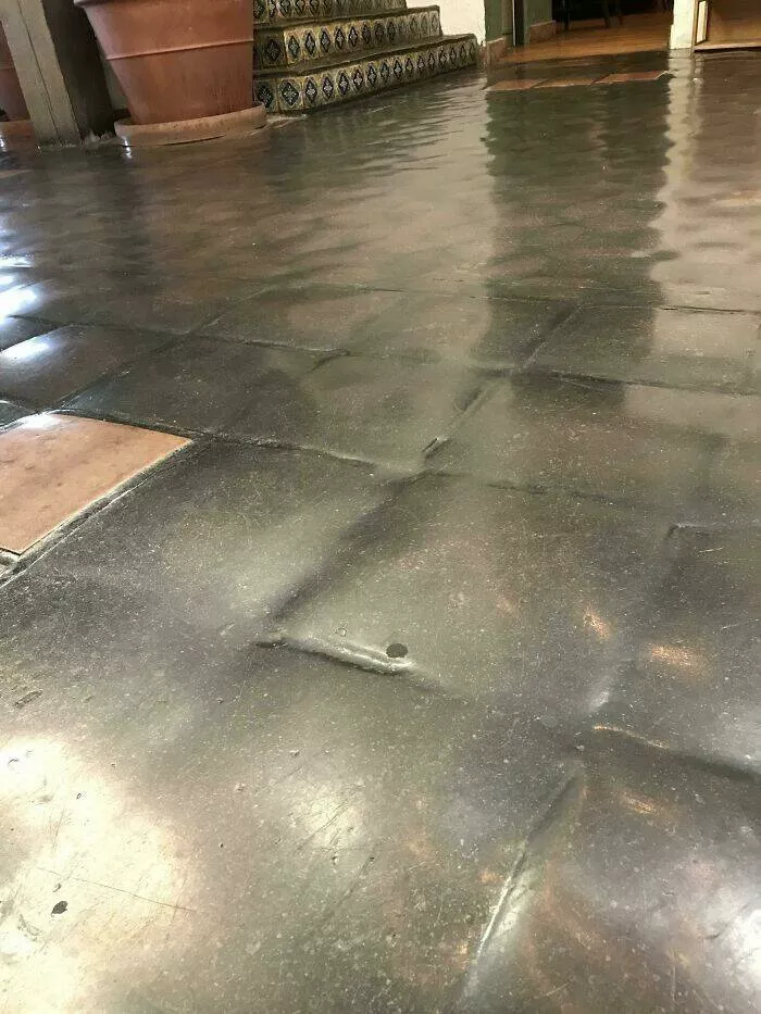Hilarious moments from married life - #29 Restaurant tiles worn down after 83 years of foot traffic