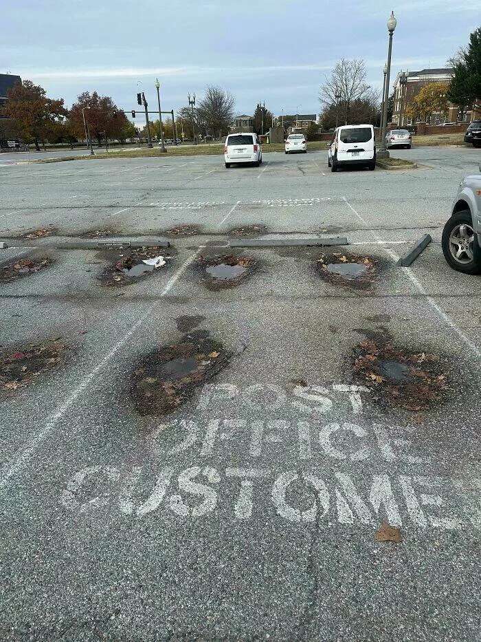 Hilarious moments from married life - #33 Parking spots at a post office built in 1934 showing years of use
