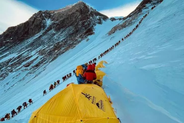 Rarely seen photos of iconic places that will change your perspective - #44 The long and treacherous line to the summit of Mount Everest: